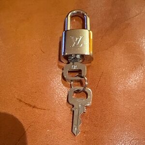 Louis Vuitton Gold Lock and Gold Key